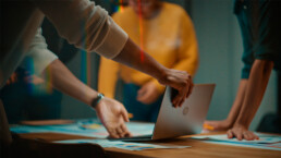 people gathered around a table working